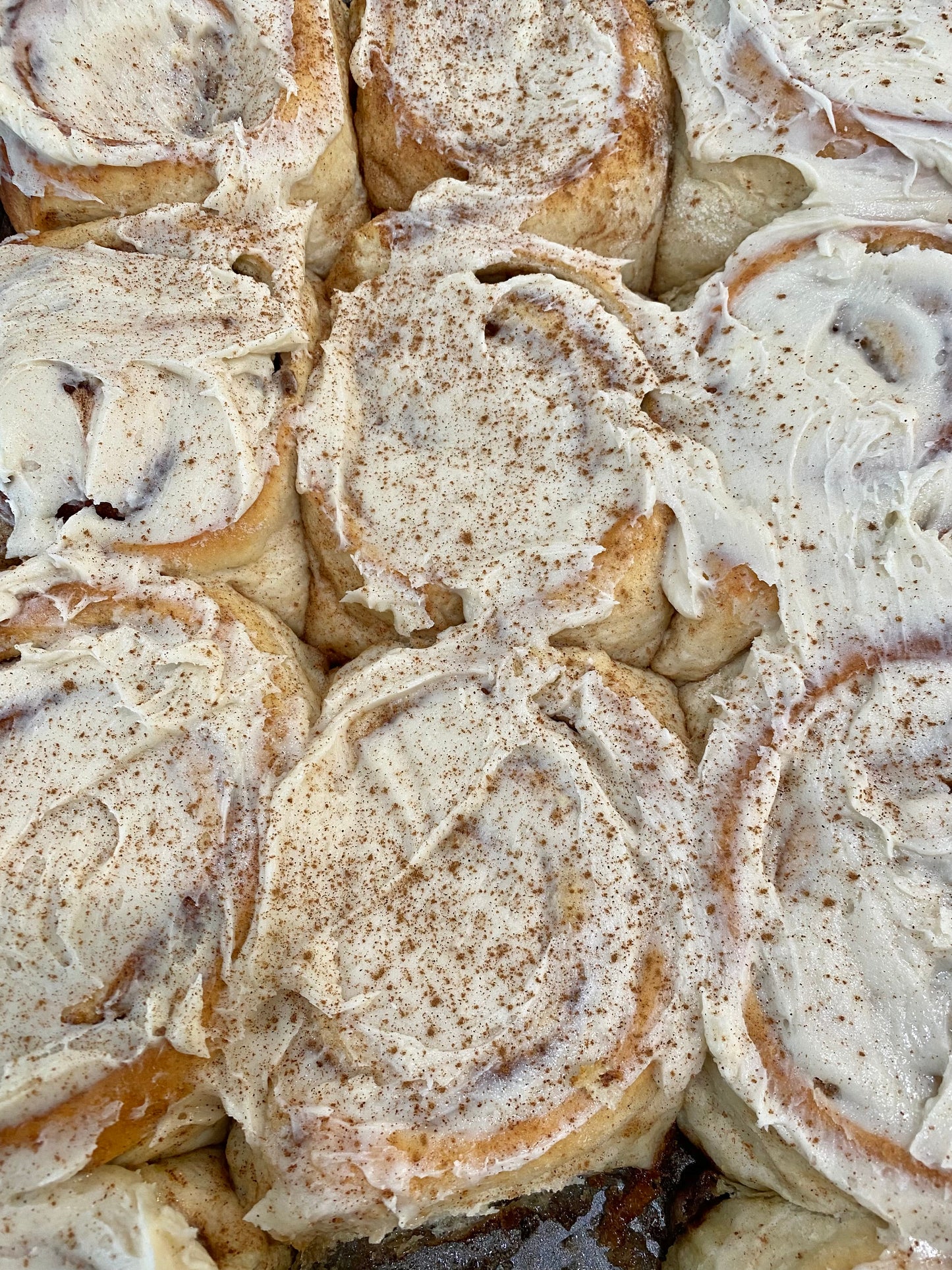 One Dozen Stacked's Famous Cinnamon Rolls with Buttercream Icing